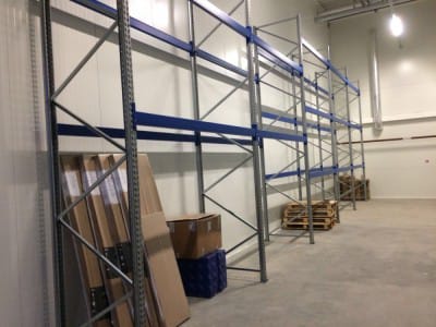 Delivery and installation of new warehouse equipment in the Sonel warehouse. Console shelving system for warehouse. Warehouse shelves and equipment VVN.LV 2
