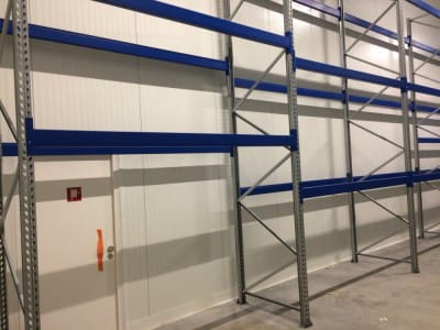 Delivery and installation of new warehouse equipment in the Sonel warehouse. Console shelving system for warehouse. Warehouse shelves and equipment VVN.LV 5