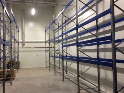 Delivery and installation of new warehouse equipment in the Sonel warehouse. Console shelving system for warehouse. Warehouse shelves and equipment VVN.LV