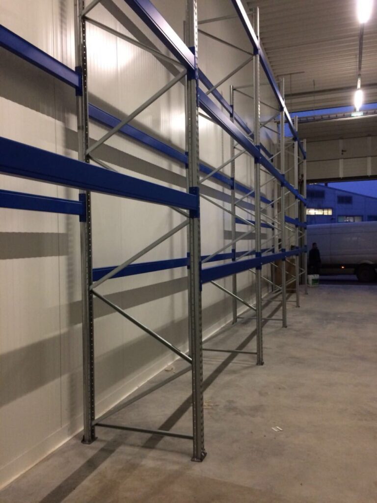 Delivery and installation of new warehouse equipment in the Sonel warehouse. Console shelving system for warehouse. Warehouse shelves and equipment VVN.LV 3