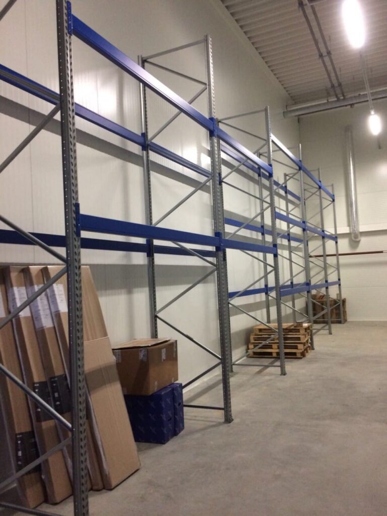 Delivery and installation of new warehouse equipment in the Sonel warehouse. Console shelving system for warehouse. Warehouse shelves and equipment VVN.LV 4